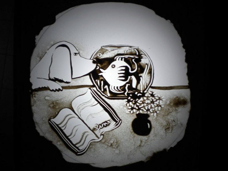 Sos-Cabaret---I-disegni-sulla-sabbia-di-Mago-Chico.JPG